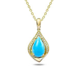 In this photo there is a yellow gold maile pendant with a blue larimar gemstone and diamonds.