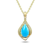 In this photo there is a yellow gold maile pendant with a blue larimar gemstone and diamonds.