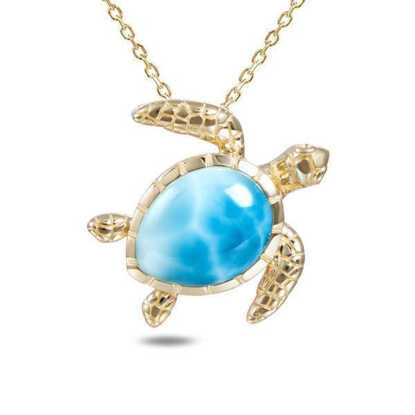 The picture shows a 14K yellow gold sea turtle pendant with a larimar gemstone and diamonds.