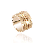The picture shows a 14K yellow gold 12 mm ring with hand engravings.