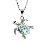 Sterling Silver Sea Turtle pendant, featuring and Abalone Shell.