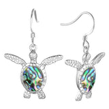 Sterling silver and abalone earrings, The eareings are detailed to look like Sea turtles, with an abalone shell.