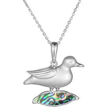 Sterling silver Nene pendant featuring the bird stood on abalone.