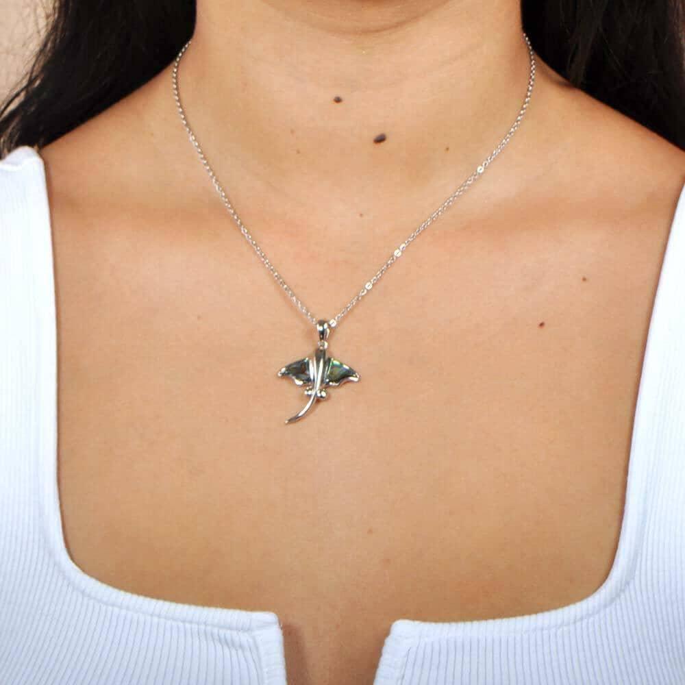 Abalone Sterling Silver Pendant designed as a stingray, worn by a model.