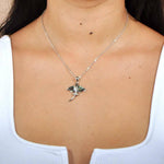 Abalone Sterling Silver Pendant designed as a stingray, worn by a model.