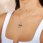 Abalone Sterling Silver Pendant designed as a stingray, worn by a model.