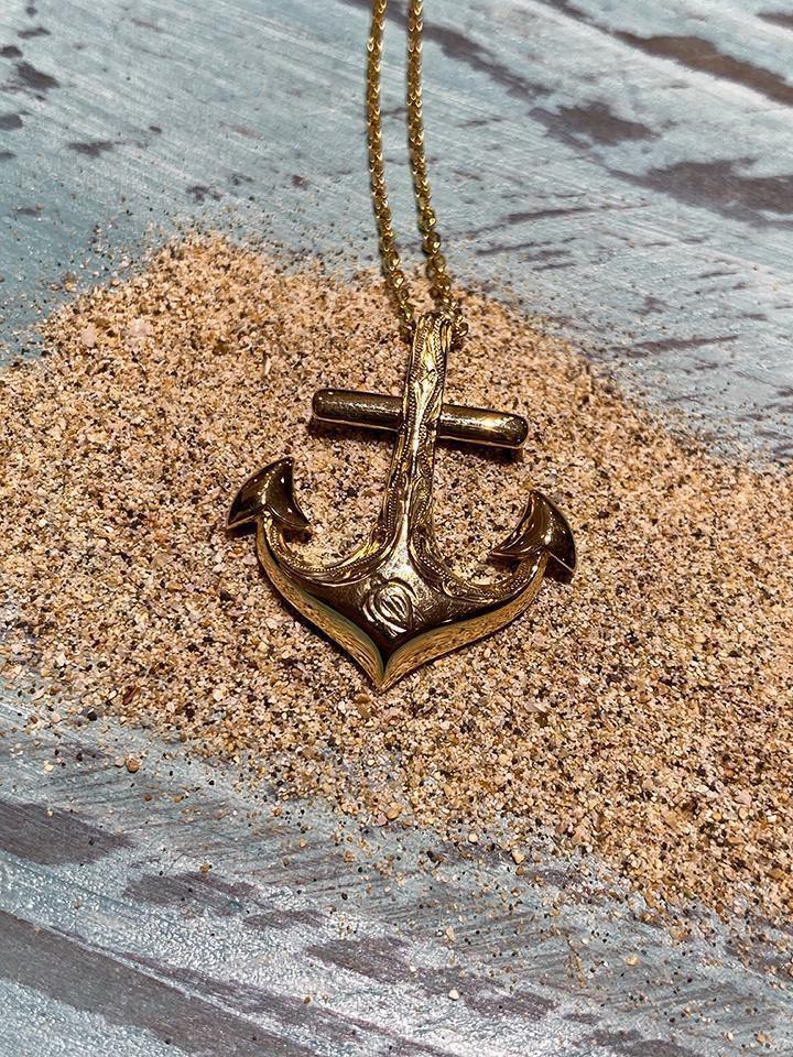 14k yellow gold anchor pendant featuring a hand-engraved sea turtle design