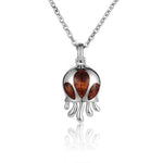Sterling silver and koa wood jellyfish pendant.