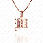 The picture shows a 14K rose gold Koa Nani W initial pendant.