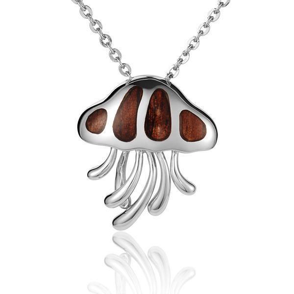 In this photo there is a sterling silver and koa wood jellyfish pendant.