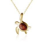 14K gold sea turtle pendant featuring a shell made out of Koa wood.