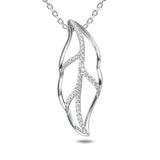 In this photo there is a sterling silver maile leaf pendant lined with topaz gemstones.