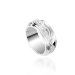 The picture shows a 925 sterling silver 8 mm ring with hand engravings of scrolls.