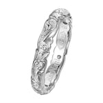 The photo shows a 4mm platinum wave infinity band ring.