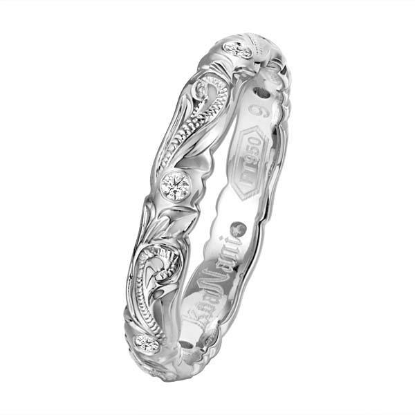 The photo shows a 4mm platinum wave infinity band ring.