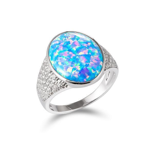 This photo shows a 925 sterling silver cocktail ring paired with an oval opalite gemstone and cubic zirconia