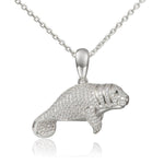 The picture shows a 925 sterling silver pavé manatee pendant with cubic zirconia.
