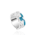The picture shows a part of a set 925 sterling silver left half cross ring with hand-engravings, heart, and a turquoise gemstone.