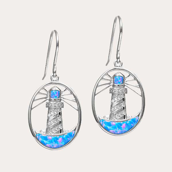 island lifestyle opal collection features a lighthouse hook earrings with sustainable blue opal and white topaz gemstones
