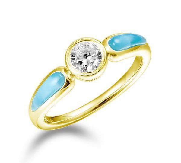 The picture shows a 14K yellow gold aquamarine ring with two larimar gemstones.