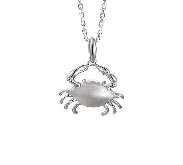 The picture shows a 14K white gold blue crab pendant.