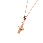 This image is of a 14K yellow gold cross charm with hand-engraved detailing.