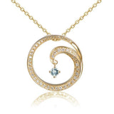 The picture shows a 14K yellow gold drop of water pendant with diamonds and aquamarine.