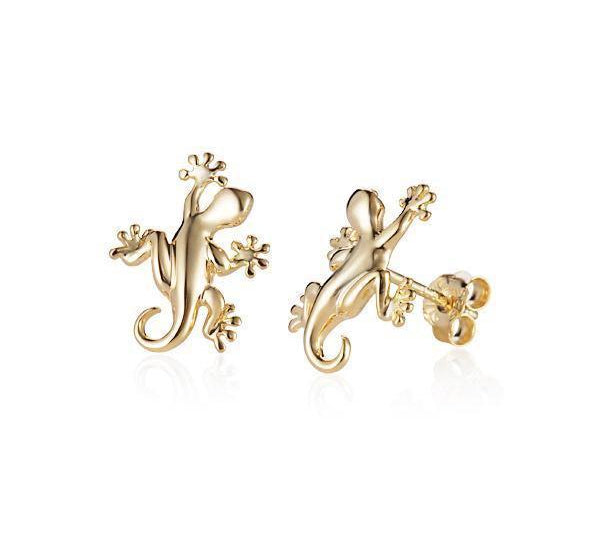 In this photo there is a pair of 14k yellow gold gecko stud earrings.