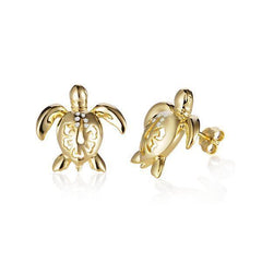 The picture shows a pair of 14K yellow gold sea turtle stud earrings with a hibiscus flower cut-out design and diamonds.