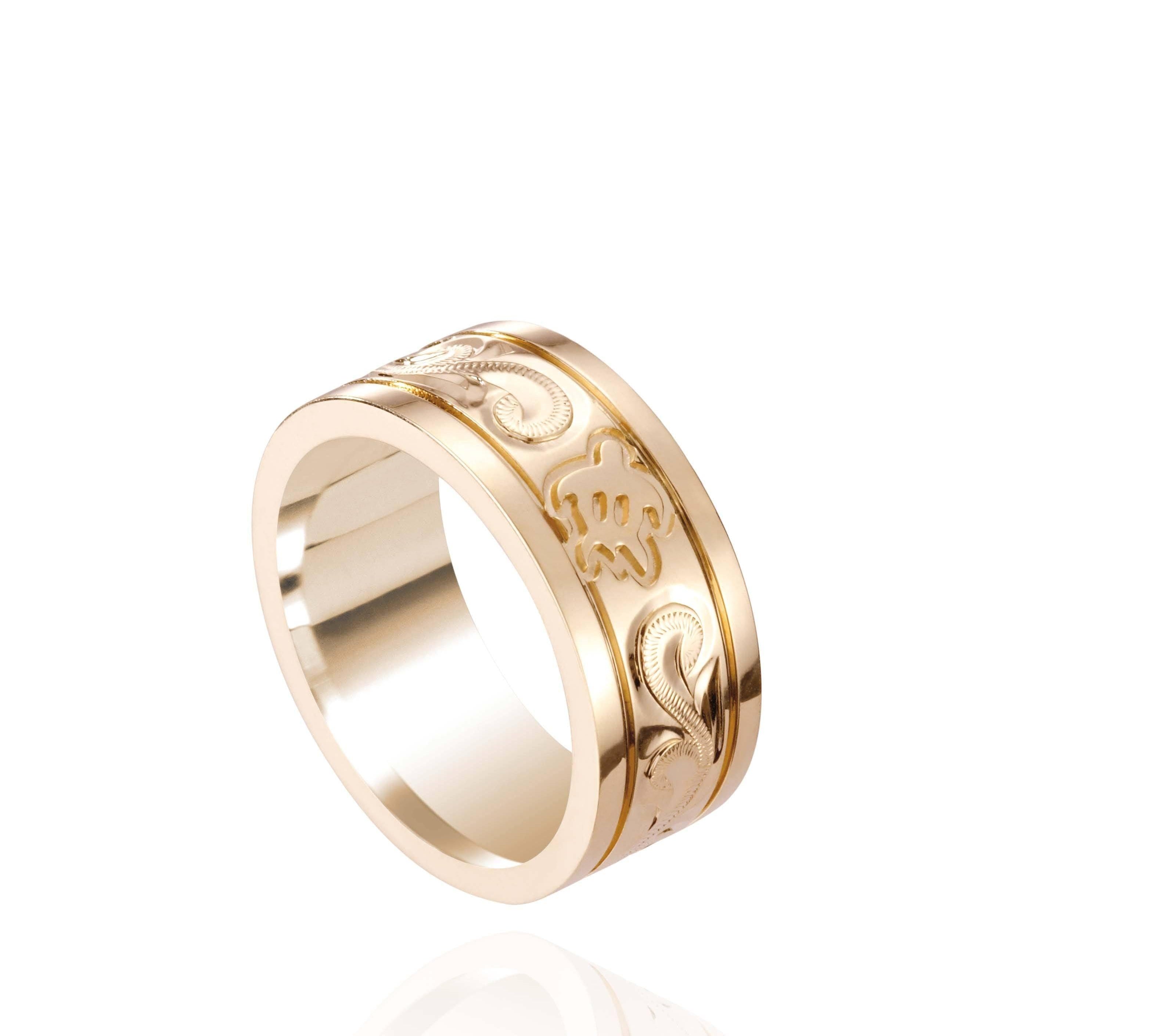 The picture shows a 14K yellow gold sea turtle (8 mm) ring.