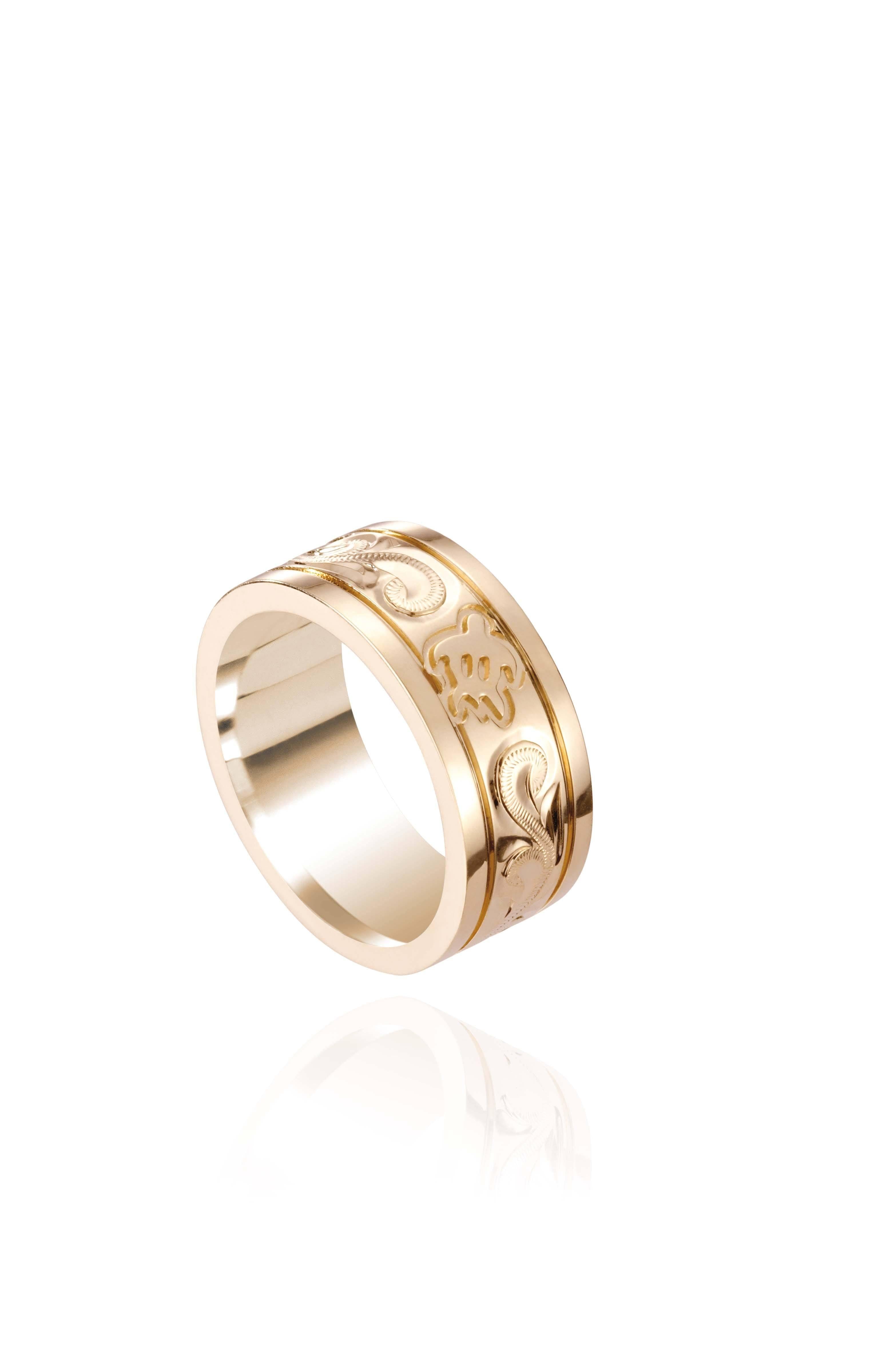 The picture shows a 14K yellow gold sea turtle (8 mm) ring.