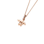 The picture shows a 14K rose gold sea turtle pendant.