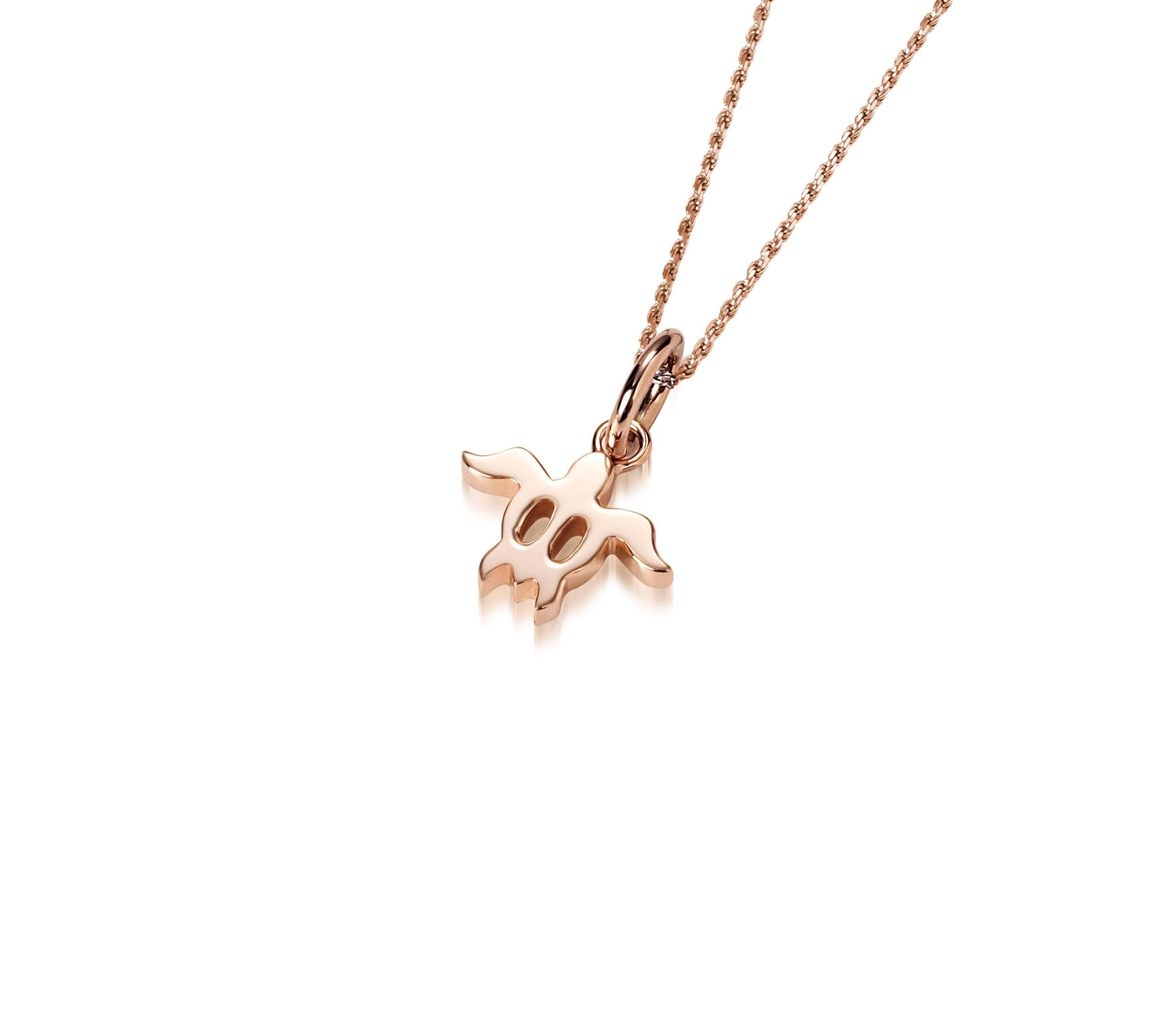 The picture shows a 14K rose gold sea turtle pendant.