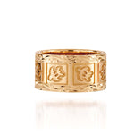 The picture shows a 10 mm 14K yellow gold sea turtle ring.