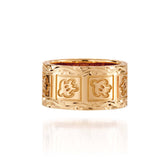 The picture shows a 10 mm 14K yellow gold sea turtle ring.