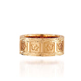 The picture shows a 14K yellow gold 8 mm ring with hand engravings including sea turtles.