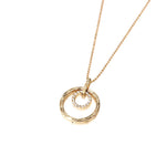 The picture shows a 14K yellow gold two circle infinity scroll pendant with hand engravings and diamonds.
