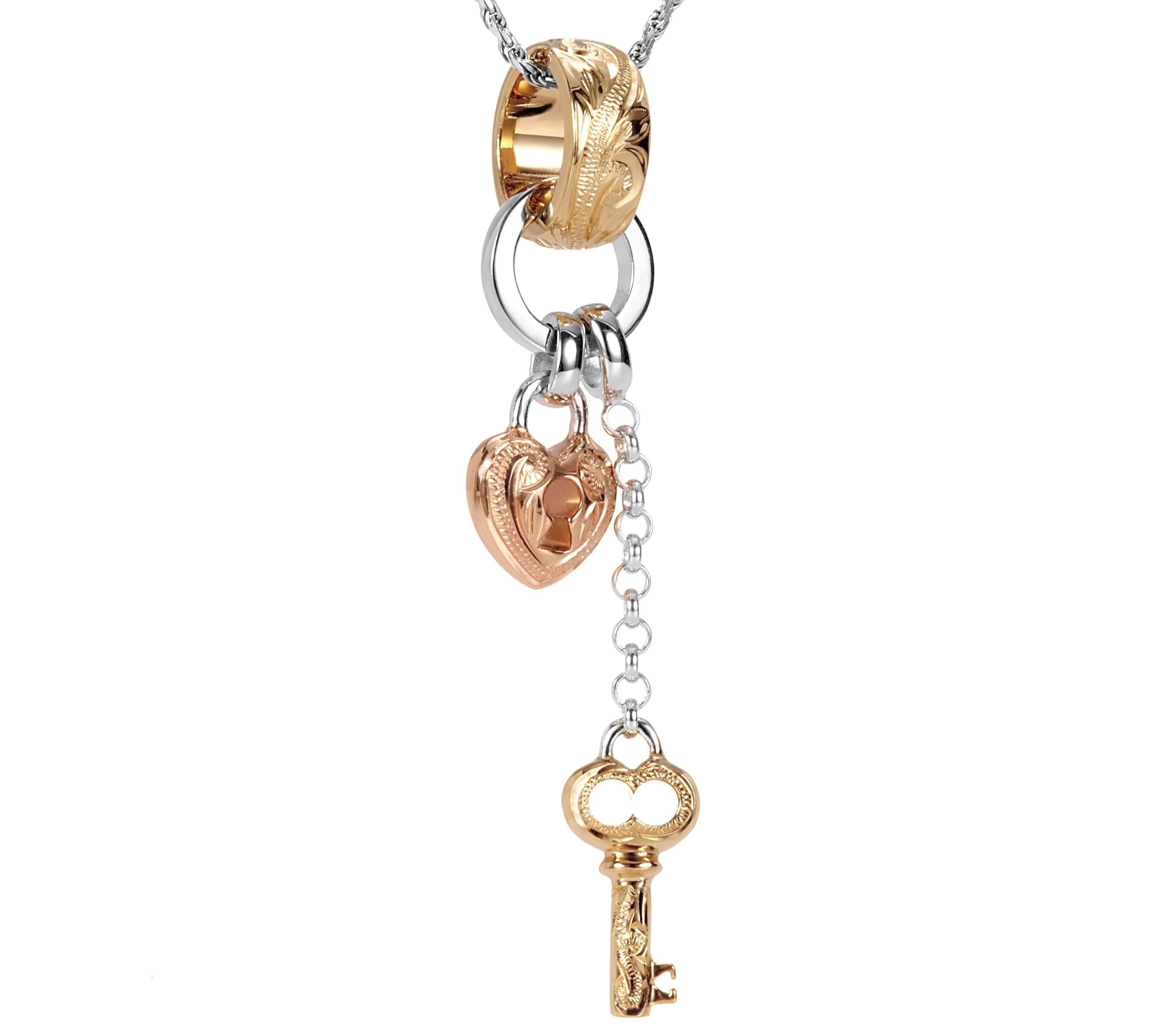 The picture shows a 14K yellow, rose, and white gold key and lock charm pendant with hand engravings.
