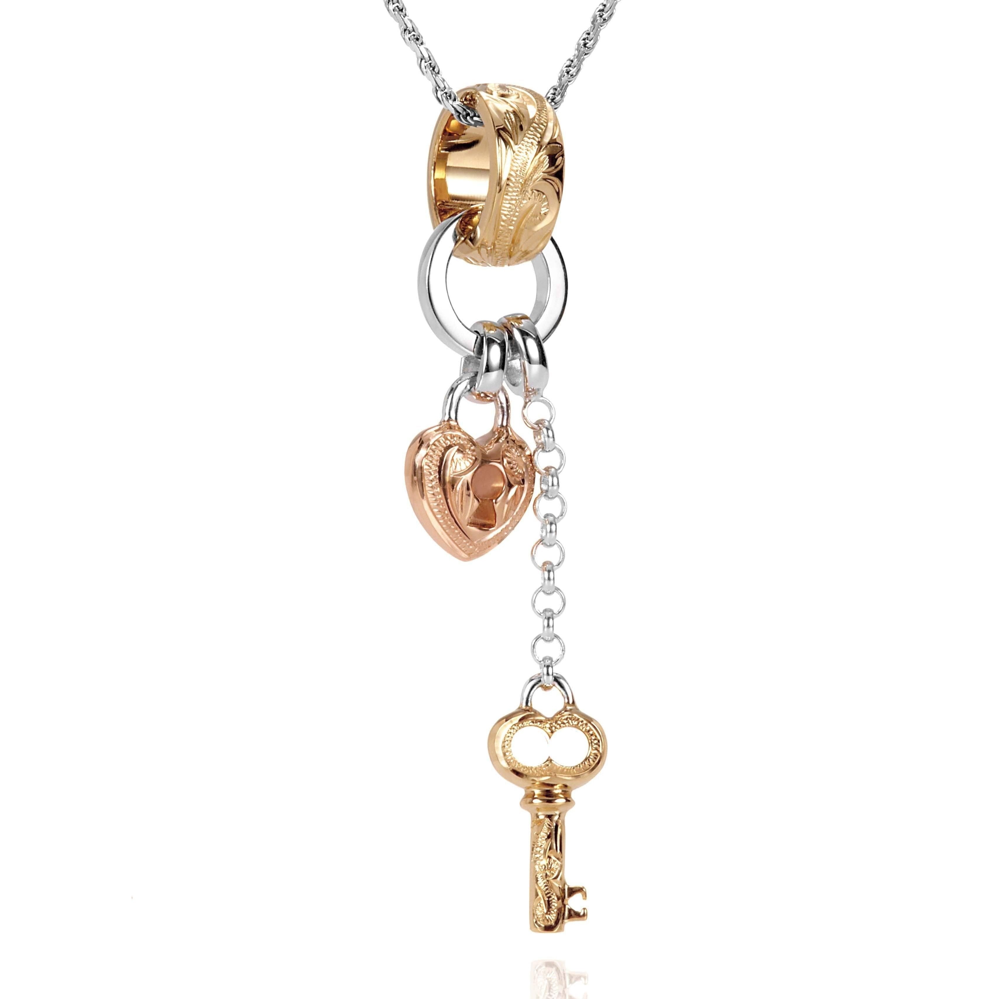 The picture shows a 14K yellow, rose, and white gold key and lock charm pendant with hand engravings.