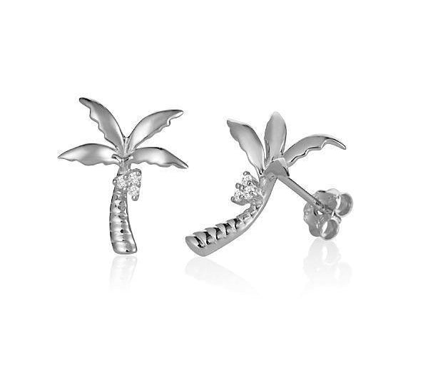 In this photo there is a pair of 14k white gold palm tree stud earrings with diamond coconuts.