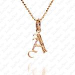 The picture shows a 14K yellow gold Koa Nani A initial pendant.