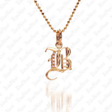 The picture shows a 14K yellow gold Koa Nani B initial pendant.