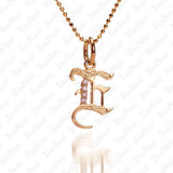 The picture shows a 14K yellow gold Koa Nani E initial pendant.