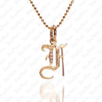 The picture shows a 14K yellow gold Koa Nani F initial pendant.