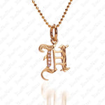 The picture shows a 14K yellow gold Koa Nani H initial pendant.