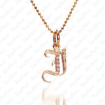 The picture shows a 14K yellow gold Koa Nani I initial pendant.