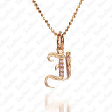 The picture shows a 14K yellow gold Koa Nani I initial pendant.