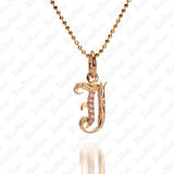 The picture shows a 14K yellow gold Koa Nani J initial pendant.