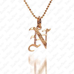 The picture shows a 14K yellow gold Koa Nani N initial pendant.