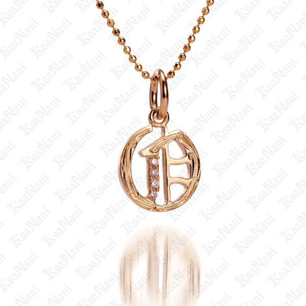 The picture shows a 14K yellow gold Koa Nani O initial pendant.